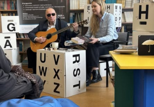 Spotkanie autorskie w bibliotece.