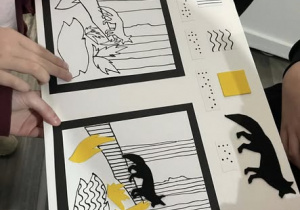 Uczniowie testują dostępność grafiki wypukłej.